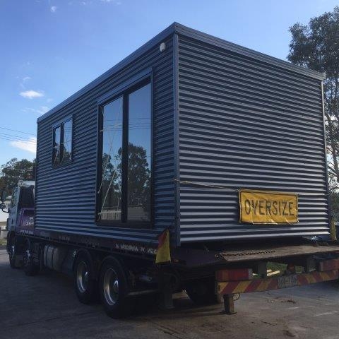 Portable building transport